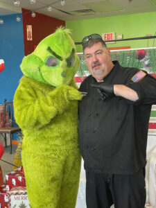 The Grinch and Chef Nick at the Jolly Holiday Market